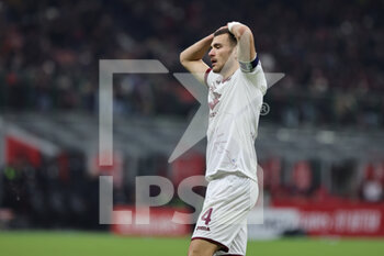 2023-01-11 - Alessandro Buongiorno of Torino FC expresses disappointment during Coppa Italia 2022/23 football match between AC Milan and Torino FC at San Siro Stadium, Milan, Italy on January 11, 2023 - AC MILAN VS TORINO FC - ITALIAN CUP - SOCCER