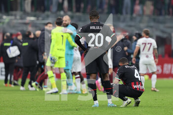 2023-01-11 - Pierre Kalulu of AC Milan seen at the end of the match during Coppa Italia 2022/23 football match between AC Milan and Torino FC at San Siro Stadium, Milan, Italy on January 11, 2023 - AC MILAN VS TORINO FC - ITALIAN CUP - SOCCER