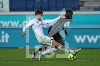 2023-01-19 - Jeremie Boga of Atalanta BC is challenged by a Spezia Calcio player - ATALANTA BC VS SPEZIA CALCIO - ITALIAN CUP - SOCCER