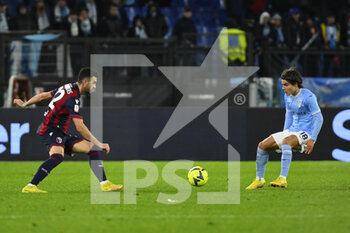 2023-01-19 - Charalampos Lykogiannis of Bologna F.C. and Luka Romero of S.S. LAZIO during the Coppa Italia eighth of finals between S.S. Lazio vs Bologna F.C. on January 19, 2023 at the Stadio Olimpico, Rome, Italy. - SS LAZIO VS BOLOGNA FC - ITALIAN CUP - SOCCER