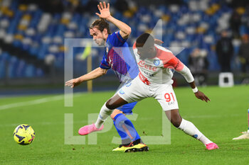 2023-01-17 - Jack Hendry of US Cremonese competes for the ball with Tanguy Ndombele' of SSC Napoli   during the Coppa Italia Freccia Rossa  match between SSC Napoli  v USC Cremonese  at Stadio Arechi   - SSC NAPOLI VS US CREMONESE - ITALIAN CUP - SOCCER