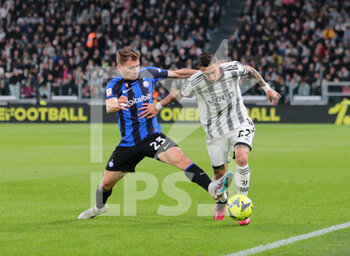 2023-04-04 - Angel Di Maria of Juventus and Nicolo Barella of FC Internazionale during the Coppa Italia, semifinal first leg,  football match between Juventus Fc and Fc Internazionale, on 04 April 2023 at Allianz Stadium, Turin, Italy. Photo Nderim Kaceli - SEMIFINAL - JUVENTUS FC VS INTER - FC INTERNAZIONALE - ITALIAN CUP - SOCCER