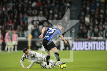 2023-04-04 - Nicolo Barella of FC Internazionale and Filip Kostic of Juventus during the Coppa Italia, semifinal first leg,  football match between Juventus Fc and Fc Internazionale, on 04 April 2023 at Allianz Stadium, Turin, Italy. Photo Nderim Kaceli - SEMIFINAL - JUVENTUS FC VS INTER - FC INTERNAZIONALE - ITALIAN CUP - SOCCER
