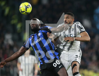 2023-04-04 - Romelo Lukaku of FC Internazionale and Bremer of Juventus during the Coppa Italia, semifinal first leg,  football match between Juventus Fc and Fc Internazionale, on 04 April 2023 at Allianz Stadium, Turin, Italy. Photo Nderim Kaceli - SEMIFINAL - JUVENTUS FC VS INTER - FC INTERNAZIONALE - ITALIAN CUP - SOCCER