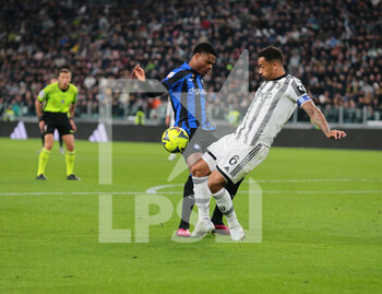 2023-04-04 - Danilo of Juventus and Denzel Dumfries of FC Internazionale during the Coppa Italia, semifinal first leg,  football match between Juventus Fc and Fc Internazionale, on 04 April 2023 at Allianz Stadium, Turin, Italy. Photo Nderim Kaceli - SEMIFINAL - JUVENTUS FC VS INTER - FC INTERNAZIONALE - ITALIAN CUP - SOCCER