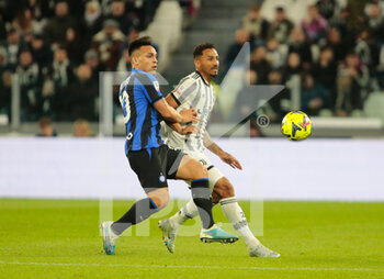 2023-04-04 - Danilo of Juventus and Lautaro Martinez of FC Internazionale during the Coppa Italia, semifinal first leg,  football match between Juventus Fc and Fc Internazionale, on 04 April 2023 at Allianz Stadium, Turin, Italy. Photo Nderim Kaceli - SEMIFINAL - JUVENTUS FC VS INTER - FC INTERNAZIONALE - ITALIAN CUP - SOCCER