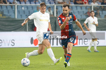 2023-08-11 - Milan Badelj (Genoa) and Nicholas Bonfanti (Modena) - GENOA CFC VS MODENA FC - ITALIAN CUP - SOCCER