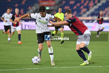 2023-08-11 - Cristian Shpendi (Cesena Fc) and Sam Beukema (Bologna Fc) in action - BOLOGNA FC VS CESENA FC - ITALIAN CUP - SOCCER