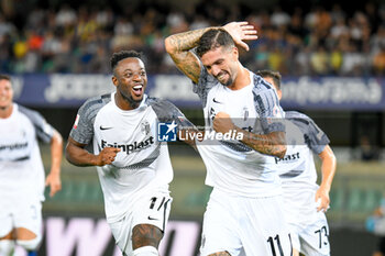2023-08-12 - Ascoli's Francesco Forte celebrates after scoring a goal on penalty with Ascoli's Claud Adjapong - HELLAS VERONA FC VS ASCOLI CALCIO - ITALIAN CUP - SOCCER