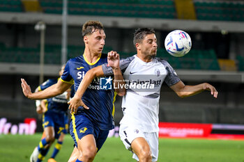 2023-08-12 - Ascoli's Samuel Giovane hindered by Verona's Filippo Terracciano - HELLAS VERONA FC VS ASCOLI CALCIO - ITALIAN CUP - SOCCER