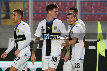 2023-11-01 - Dennis Man of Parma Calcio celebrates after scoring a goal with teammates - US LECCE VS PARMA CALCIO - ITALIAN CUP - SOCCER