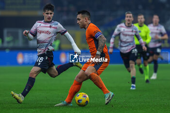 2023-12-20 - Lautaro Martinez of FC Internazionale seen in action during Coppa Italia 2023/24 Round of 16 football match between FC Internazionale and Bologna FC at Giuseppe Meazza Stadium, Milan, Italy on December 20, 2023 - INTER - FC INTERNAZIONALE VS BOLOGNA FC - ITALIAN CUP - SOCCER