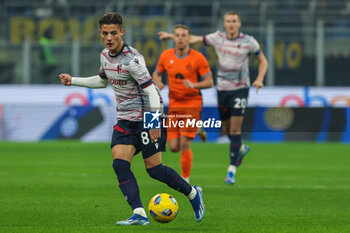 2023-12-20 - Kacper Urbanski of Bologna FC seen in action during Coppa Italia 2023/24 Round of 16 football match between FC Internazionale and Bologna FC at Giuseppe Meazza Stadium, Milan, Italy on December 20, 2023 - INTER - FC INTERNAZIONALE VS BOLOGNA FC - ITALIAN CUP - SOCCER