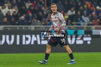 2023-12-20 - Alexis Saelemaekers of Bologna FC seen in action during Coppa Italia 2023/24 Round of 16 football match between FC Internazionale and Bologna FC at Giuseppe Meazza Stadium, Milan, Italy on December 20, 2023 - INTER - FC INTERNAZIONALE VS BOLOGNA FC - ITALIAN CUP - SOCCER