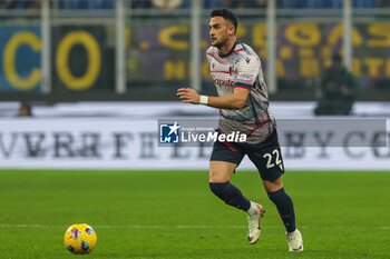 2023-12-20 - Charalampos Lykogiannis of Bologna FC seen in action during Coppa Italia 2023/24 Round of 16 football match between FC Internazionale and Bologna FC at Giuseppe Meazza Stadium, Milan, Italy on December 20, 2023 - INTER - FC INTERNAZIONALE VS BOLOGNA FC - ITALIAN CUP - SOCCER