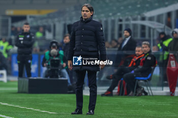 2023-12-20 - Simone Inzaghi Head Coach of FC Internazionale looks on during Coppa Italia 2023/24 Round of 16 football match between FC Internazionale and Bologna FC at Giuseppe Meazza Stadium, Milan, Italy on December 20, 2023 - INTER - FC INTERNAZIONALE VS BOLOGNA FC - ITALIAN CUP - SOCCER