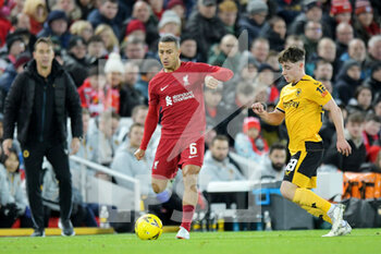2023-01-07 - Liverpool midfielder Thiago Alcantara (6) and Joe Hodge of Wolverhampton Wanderers during the English FA Cup, 3rd round football match between Liverpool and Wolverhampton Wanderers on January 7, 2023 at Anfield stadium in Liverpool, England - FOOTBALL - ENGLISH CUP - LIVERPOOL V WOLVERHAMPTON - ENGLISH LEAGUE CUP - SOCCER