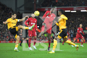 2023-01-07 - Wolverhampton Wanderers defender Jonny (19) clears the ball from Liverpool defender Ibrahima Konate (5) during the English FA Cup, 3rd round football match between Liverpool and Wolverhampton Wanderers on January 7, 2023 at Anfield stadium in Liverpool, England - FOOTBALL - ENGLISH CUP - LIVERPOOL V WOLVERHAMPTON - ENGLISH LEAGUE CUP - SOCCER
