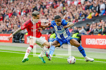2023-04-24 - Pervis Estupinan (30) of Brighton & Hove Albion tussles with Antony (21) of Manchester United during the English championship, FA Cup semi final football match between Brighton and Hove Albion and Manchester United on 23 April 2023 at Wembley Stadium in London, England - FOOTBALL - ENGLISH CUP - BRIGHTON V MANCHESTER UNITED - ENGLISH LEAGUE CUP - SOCCER