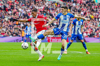 2023-04-24 - Julio Enciso (20) of Brighton & Hove Albion battles with Anthony Martial (9) of Manchester United during the English championship, FA Cup semi final football match between Brighton and Hove Albion and Manchester United on 23 April 2023 at Wembley Stadium in London, England - FOOTBALL - ENGLISH CUP - BRIGHTON V MANCHESTER UNITED - ENGLISH LEAGUE CUP - SOCCER