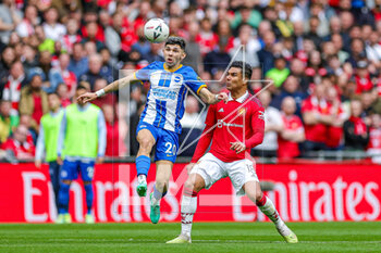 2023-04-24 - Julio Enciso (20) of Brighton & Hove Albion battles with Casemiro (18) of Manchester United during the English championship, FA Cup semi final football match between Brighton and Hove Albion and Manchester United on 23 April 2023 at Wembley Stadium in London, England - FOOTBALL - ENGLISH CUP - BRIGHTON V MANCHESTER UNITED - ENGLISH LEAGUE CUP - SOCCER