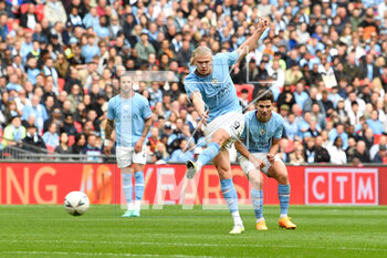 2023-04-24 - Erling Haaland (9) of Manchester City shoots during the English Cup, FA Cup semi final football match between Manchester City and Sheffield United on 22 April 2023 at Wembley Stadium in London, England - FOOTBALL - ENGLISH CUP - MANCHESTER CITY V SHEFFIELD UNITED - ENGLISH LEAGUE CUP - SOCCER
