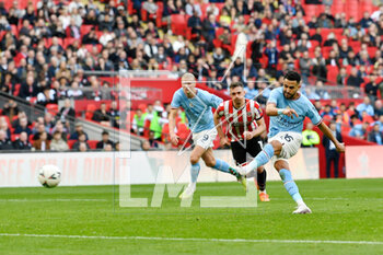 2023-04-24 - Riyad Mahrez (26) of Manchester City scores the opening goal from the penalty spot 1-0 during the English Cup, FA Cup semi final football match between Manchester City and Sheffield United on 22 April 2023 at Wembley Stadium in London, England - FOOTBALL - ENGLISH CUP - MANCHESTER CITY V SHEFFIELD UNITED - ENGLISH LEAGUE CUP - SOCCER