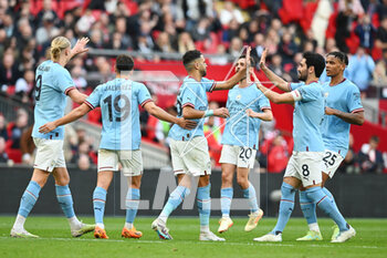 2023-04-24 - Riyad Mahrez (26) of Manchester City celebrates scoring the opening goal from the penalty spot 1-0 during the English Cup, FA Cup semi final football match between Manchester City and Sheffield United on 22 April 2023 at Wembley Stadium in London, England - FOOTBALL - ENGLISH CUP - MANCHESTER CITY V SHEFFIELD UNITED - ENGLISH LEAGUE CUP - SOCCER