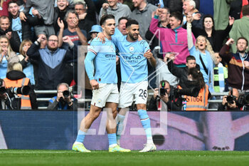 2023-04-24 - Riyad Mahrez (26) of Manchester City celebrates scoring his third goal 3-0 during the English Cup, FA Cup semi final football match between Manchester City and Sheffield United on 22 April 2023 at Wembley Stadium in London, England - FOOTBALL - ENGLISH CUP - MANCHESTER CITY V SHEFFIELD UNITED - ENGLISH LEAGUE CUP - SOCCER