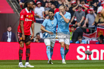 2023-06-04 - İlkay Gundogan (8) of Manchester City scores a goal and celebrates 1-0 with Erling Haaland during the English FA Cup, Final football match between Manchester City and Manchester United on 3 June 2023 at Wembley Stadium in London, England - FOOTBALL - ENGLISH CUP - FINAL - MANCHESTER CITY V MANCHESTER UNITED - ENGLISH LEAGUE CUP - SOCCER