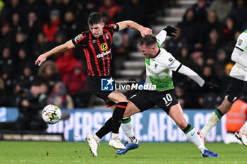 2023-11-01 - Alexis Mac Allister (10) of Liverpool battles for possession with Ryan Christie (10) of AFC Bournemouth during the English League Cup, EFL Carabao Cup, round of 16 football match between Bournemouth and Liverpool on 1 November 2023 at the Vitality Stadium in Bournemouth, England - FOOTBALL - ENGLISH LEAGUE CUP - BOURNEMOUTH V LIVERPOOL - ENGLISH LEAGUE CUP - SOCCER