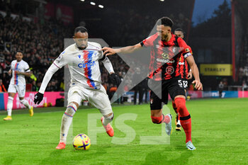 2023-01-01 - Jordan Ayew (9) of Crystal Palace battles for possession with Lloyd Kelly (5) of AFC Bournemouth during the English championship Premier League football match between Bournemouth and Crystal Palace on 31 December 2022 at the Vitality Stadium in Bournemouth, England - FOOTBALL - ENGLISH CHAMP - BOURNEMOUTH V CRYSTAL PALACE - ENGLISH PREMIER LEAGUE - SOCCER