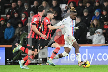 2023-01-01 - Wilfried Zaha (11) of Crystal Palace on the attack battles for possession with Ryan Christie (10) of AFC Bournemouth during the English championship Premier League football match between Bournemouth and Crystal Palace on 31 December 2022 at the Vitality Stadium in Bournemouth, England - FOOTBALL - ENGLISH CHAMP - BOURNEMOUTH V CRYSTAL PALACE - ENGLISH PREMIER LEAGUE - SOCCER