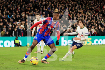 2023-01-04 - Crystal Palace forward Wilfred Zaha during the English championship Premier League football match between Crystal Palace and Tottenham Hotspur on January 4, 2023 at Selhurst Park in London, England - FOOTBALL - ENGLISH CHAMP - CRYSTAL PALACE V TOTTENHAM - ENGLISH PREMIER LEAGUE - SOCCER