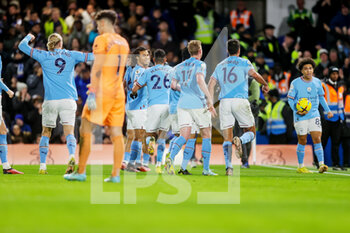 2023-01-05 - Manchester City forward Riyad Mahrez (26) celebrates with teammates after scoring a goal 0-1 during the English championship Premier League football match between Chelsea and Manchester City on January 5, 2023 at Stamford Bridge in London, England - FOOTBALL - ENGLISH CHAMP - CHELSEA V MANCHESTER CITY - ENGLISH PREMIER LEAGUE - SOCCER
