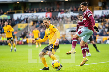 2023-01-14 - Wolverhampton Wanderers midfielder Joao Moutinho (28) and Pablo Fornals of West Ham during the English championship Premier League football match between Wolverhampton Wanderers and West Ham United on January 14, 2023 at Molineux stadium in Wolverhampton, England - FOOTBALL - ENGLISH CHAMP - WOLVERHAMPTON V WEST HAM - ENGLISH PREMIER LEAGUE - SOCCER
