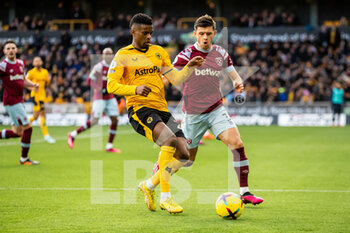 2023-01-14 - Wolverhampton Wanderers defender Nelson Semedo (22) and Aaron Cresswell of West Ham during the English championship Premier League football match between Wolverhampton Wanderers and West Ham United on January 14, 2023 at Molineux stadium in Wolverhampton, England - FOOTBALL - ENGLISH CHAMP - WOLVERHAMPTON V WEST HAM - ENGLISH PREMIER LEAGUE - SOCCER