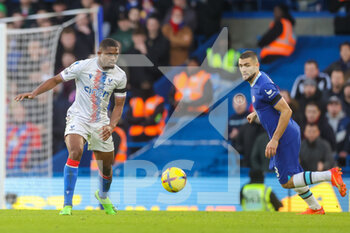 2023-01-15 - Crystal Palace midfielder Cheick Doucouré (28) and Chelsea midfielder Mateo Kovačić (8) during the Premier League match between Chelsea and Crystal Palace at Stamford Bridge, London, England on 15 January 2023. Photos Toyin Oshodi / ProSportsImages / DPPI - FOOTBALL - ENGLISH CHAMP - CHELSEA V CRYSTAL PALACE - ENGLISH PREMIER LEAGUE - SOCCER