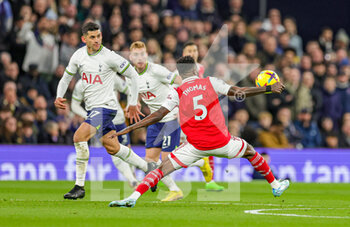 2023-01-16 - Thomas Partey (5) of Arsenal with a hand ball during the Premier League match between Tottenham Hotspur and Arsenal at Tottenham Hotspur Stadium, London, United Kingdom on 15 January 2023. Photo Nigel Keene/ProSportsImages / DPPI - FOOTBALL - ENGLISH CHAMP - TOTTENHAM V ARSENAL - ENGLISH PREMIER LEAGUE - SOCCER