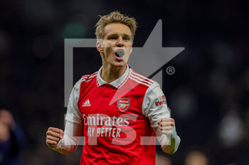 2023-01-16 - Martin Odegaard (8) of Arsenal celebrates at full time at full time during the Premier League match between Tottenham Hotspur and Arsenal at Tottenham Hotspur Stadium, London, United Kingdom on 15 January 2023. Photo Nigel Keene/ProSportsImages / DPPI - FOOTBALL - ENGLISH CHAMP - TOTTENHAM V ARSENAL - ENGLISH PREMIER LEAGUE - SOCCER