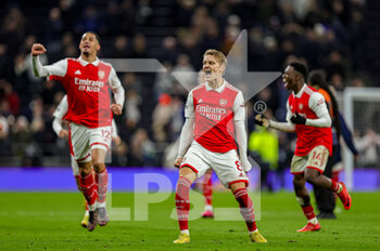 2023-01-16 - Martin Odegaard (8) of Arsenal celebrates at full time at full time during the Premier League match between Tottenham Hotspur and Arsenal at Tottenham Hotspur Stadium, London, United Kingdom on 15 January 2023. Photo Nigel Keene/ProSportsImages / DPPI - FOOTBALL - ENGLISH CHAMP - TOTTENHAM V ARSENAL - ENGLISH PREMIER LEAGUE - SOCCER