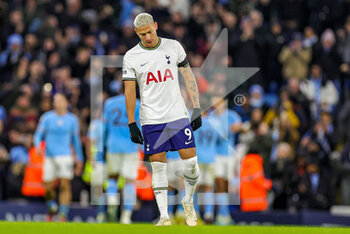 2023-01-20 - Richarlison (9) of Tottenham Hotspur looks dejected as Manchester City players celebrate during the English championship Premier League football match between Manchester City and Tottenham Hotspur on January 19, 2023 at the Etihad Stadium in Manchester, England - FOOTBALL - ENGLISH CHAMP - MANCHESTER CITY V TOTTENHAM - ENGLISH PREMIER LEAGUE - SOCCER