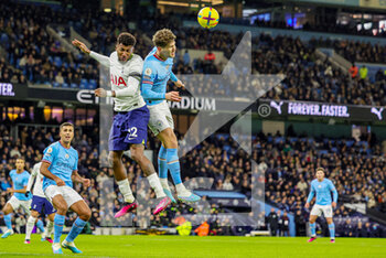 2023-01-20 - John Stones (5) of Manchester City and Emerson (12) of Tottenham Hotspur during the English championship Premier League football match between Manchester City and Tottenham Hotspur on January 19, 2023 at the Etihad Stadium in Manchester, England - FOOTBALL - ENGLISH CHAMP - MANCHESTER CITY V TOTTENHAM - ENGLISH PREMIER LEAGUE - SOCCER