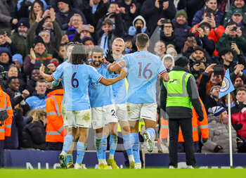 2023-01-20 - Riyad Mahrez (26) of Manchester City celebrates his goal 4-2 with teammates during the English championship Premier League football match between Manchester City and Tottenham Hotspur on January 19, 2023 at the Etihad Stadium in Manchester, England - FOOTBALL - ENGLISH CHAMP - MANCHESTER CITY V TOTTENHAM - ENGLISH PREMIER LEAGUE - SOCCER