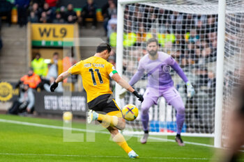 2023-02-04 - Wolverhampton Wanderers forward Hwang Hee-Chan (11) scores a goal 1-0 during the English championship Premier League football match between Wolverhampton Wanderers and Liverpool on February 4, 2023 at Molineux stadium in Wolverhampton, England - FOOTBALL - ENGLISH CHAMP - WOLVERHAMPTON V LIVERPOOL - ENGLISH PREMIER LEAGUE - SOCCER
