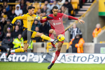 2023-02-04 - Wolverhampton Wanderers midfielder Matheus Nunes (27) and Liverpool defender Joel Matip (32) during the English championship Premier League football match between Wolverhampton Wanderers and Liverpool on February 4, 2023 at Molineux stadium in Wolverhampton, England - FOOTBALL - ENGLISH CHAMP - WOLVERHAMPTON V LIVERPOOL - ENGLISH PREMIER LEAGUE - SOCCER