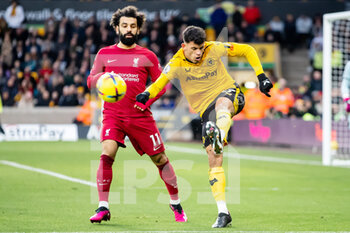 2023-02-04 - Wolverhampton Wanderers midfielder Matheus Nunes (27) and Liverpool forward Mohamed Salah during the English championship Premier League football match between Wolverhampton Wanderers and Liverpool on February 4, 2023 at Molineux stadium in Wolverhampton, England - FOOTBALL - ENGLISH CHAMP - WOLVERHAMPTON V LIVERPOOL - ENGLISH PREMIER LEAGUE - SOCCER