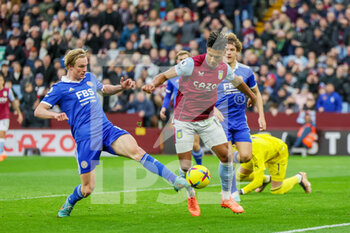 2023-02-04 - Leicester City defender Victor Kristiansen (16) clears from Aston Villa forward Ollie Watkins (11) during the English championship Premier League football match between Aston Villa and Leicester City on February 4, 2023 at Villa Park in Birmingham, England - FOOTBALL - ENGLISH CHAMP - ASTON VILLA V LEICESTER - ENGLISH PREMIER LEAGUE - SOCCER