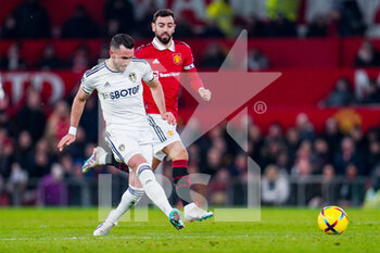 2023-02-08 - Leeds United midfielder Jack Harrison (11) and Bruno Fernandes of Manchester United during the English championship Premier League football match between Manchester United and Leeds United on February 8, 2023 at Old Trafford in Manchester, England - FOOTBALL - ENGLISH CHAMP - MANCHESTER UNITED V LEEDS - ENGLISH PREMIER LEAGUE - SOCCER