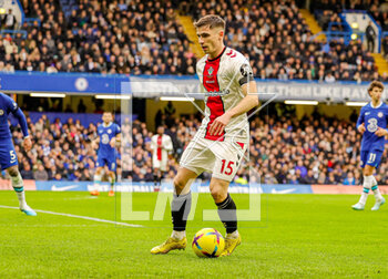 2023-02-19 - Romain Perraud (15) of Southampton during the English championship Premier League football match between Chelsea and Southampton on February 18, 2023 at Stamford Bridge in London, England - FOOTBALL - ENGLISH CHAMP - CHELSEA V SOUTHAMPTON - ENGLISH PREMIER LEAGUE - SOCCER
